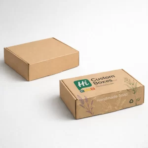 Two rectangular kraft paper mailing boxes, one plain and one printed