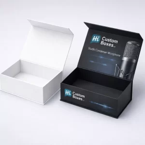 An open white magnetic gift box next to a premium black box for a condenser microphone.