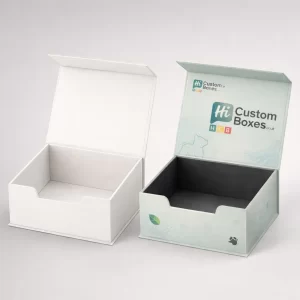 Two premium magnetic gift boxes with hinged lids, featuring one plain white and one branded design.