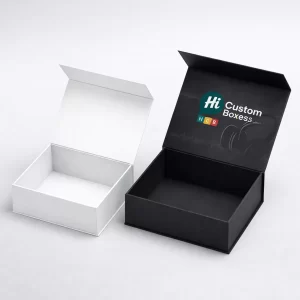 A white magnetic closure box next to a black luxury box
