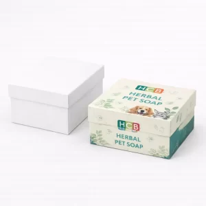 Two open flat-style cardboard boxes, one blank white and one with a colourful sitting dog illustration.