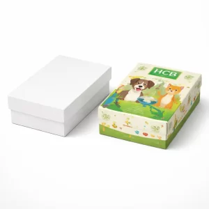 Two square rigid boxes with lids, one minimalist white and one with vibrant orange and teal pet graphics.