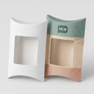 White pillow box and decorative teal-tan pillow box- both featuring a square window