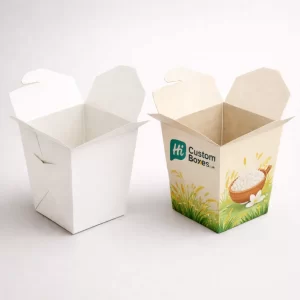 Two cardboard noodle-style take-away boxes, one plain white and one printed with a rice field design.