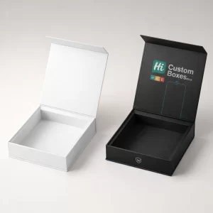Two open square rigid boxes, one white and one black, showing the premium branded interior lid.