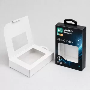 Two rectangular cardboard boxes; one is plain white with an open lid and a clear window.