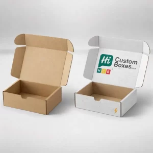 Two small corrugated cardboard mailer boxes, one plain brown and one white with a logo.