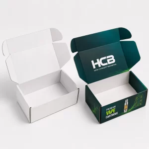 Custom printed corrugated mailer boxes for vape cartridges displayed alongside a plain white sample box.