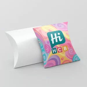Wholesale pillow boxes including a plain white version and one with colourful swirls and HCB branding
