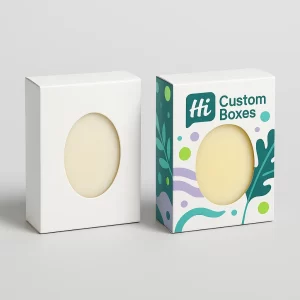 Two tuck-end boxes with an oval window for displaying a round bar of soap