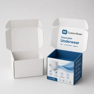 Two square cardboard boxes, one plain and one printed with purple floral feminine care designs.