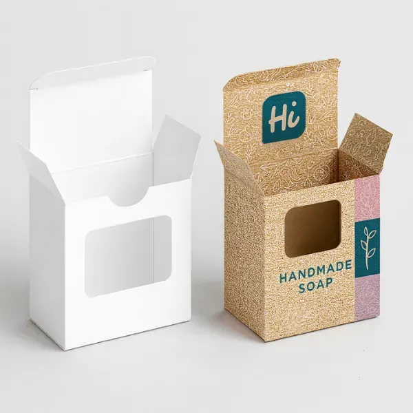 Printed tuck-end soap packaging box with floral artwork and -Handmade Soap- branding- shown next to a plain white box