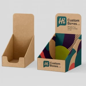 Two counter display boxes- one plain Kraft- one colourful with -Custom Boxes- branding