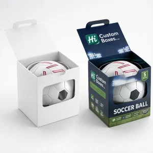 Two square boxes with circular windows and lids, showcasing footballs inside against a professional sports-themed background.