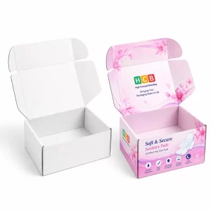 Two open mailing boxes, one plain white and one with pink floral feminine hygiene branding.