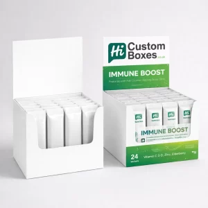 Two counter display boxes filled with immune boost sachets, featuring white and green-themed custom designs.