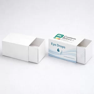 Two slide-out drawer boxes, one minimal white and one featuring blue medical branding and liquid graphics.