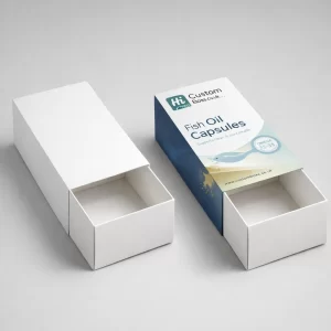 Two white sliding drawer boxes, one blank and one with professional blue medical-style product labelling.