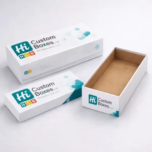 Two medicine boxes, one plain white and one teal featuring