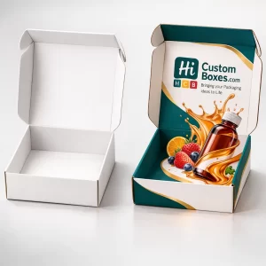 Two open square mailer boxes, one plain white and one featuring vibrant splash graphics and syrup branding.