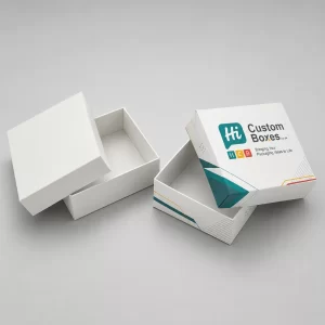 Custom tuck-end playing card boxes stacked vertically against a neutral grey backdrop